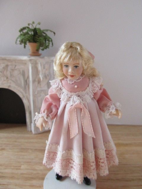 A Complete Porcelain Dollhouse Family: What Separates the $600 Sets From the $40 Ones